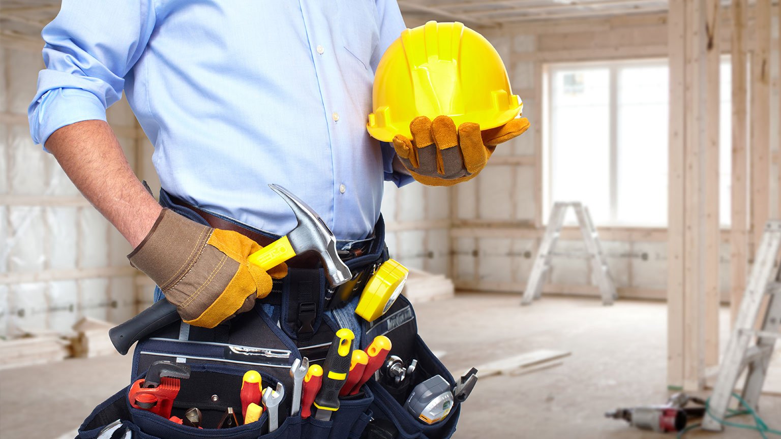 Handyman with tools Société pose de carrelage
